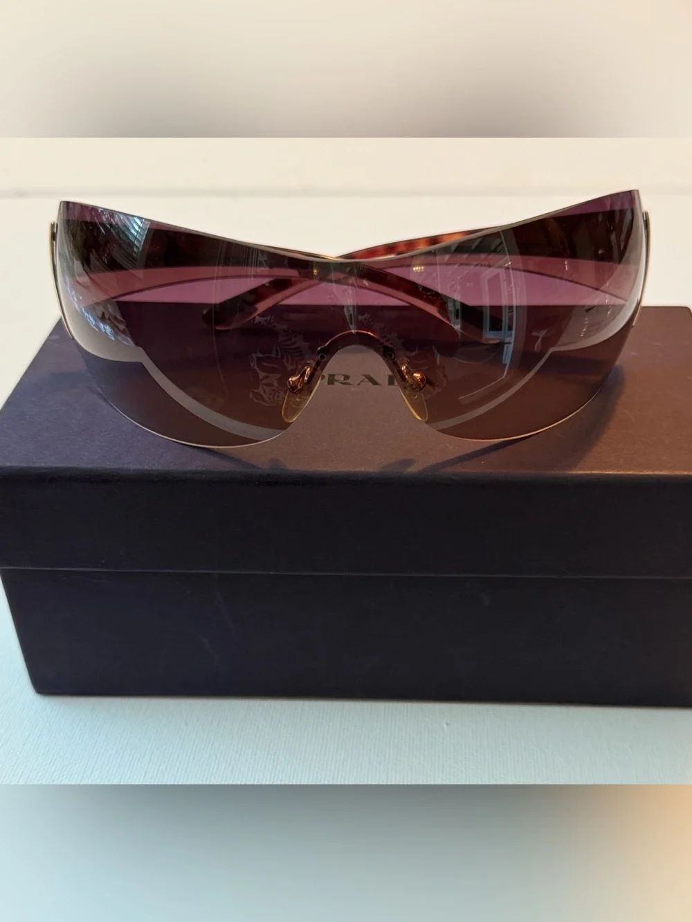 Prada Brown Gradient Rimless Sunglasses with Gold Accents